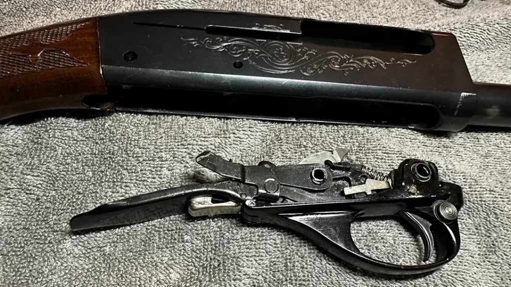 The author also cleaned the trigger group and receiver using solvent, a brush, and a microfiber towel.