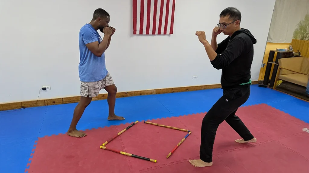 Defensive Footwork: Brian and Adam both step off into an Angle 1 V-Step.