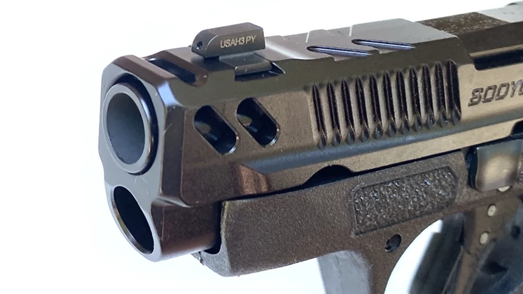 Additional dual diagonal cuts on the sides of the slide&rsquo;s nose seem more about lightening the slide than venting gas.