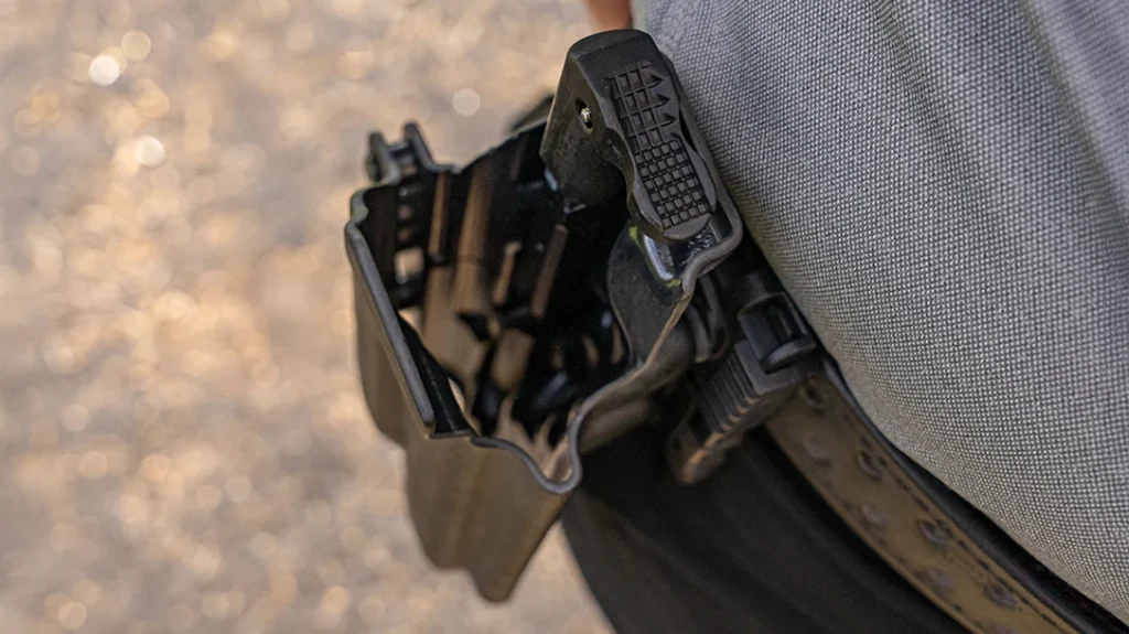 The push-button release doesn’t feel like a hindrance or a challenge to depress because the thumb naturally lands on this spot when you go to grip and draw the pistol.