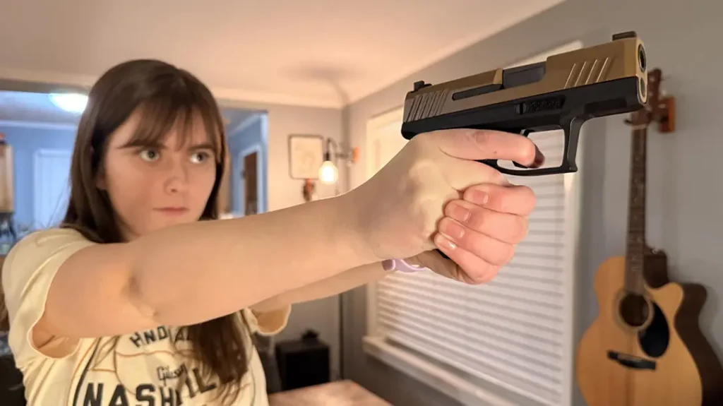 The author performed her drawing from a holster training with a Taurus GX4.