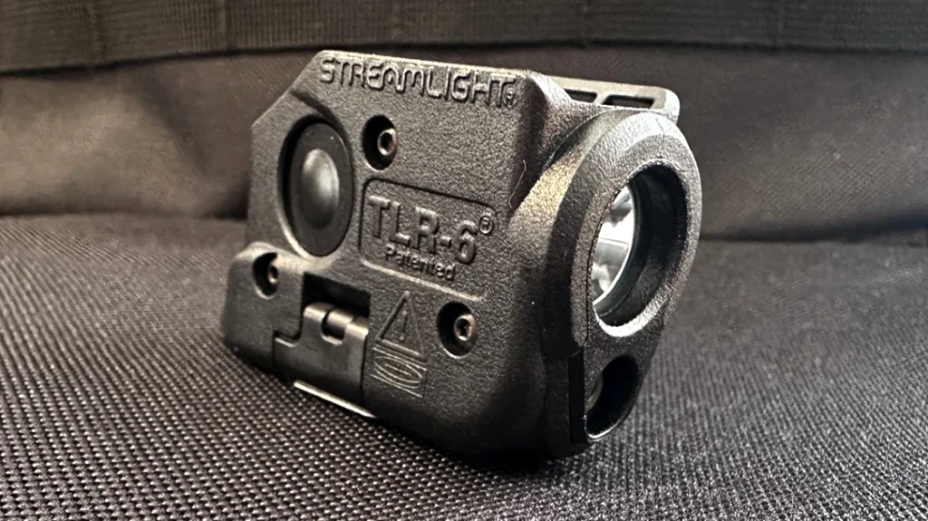 One of the author&rsquo;s first light modifications for her handgun was the Streamlight TLR-6 Gun Light.