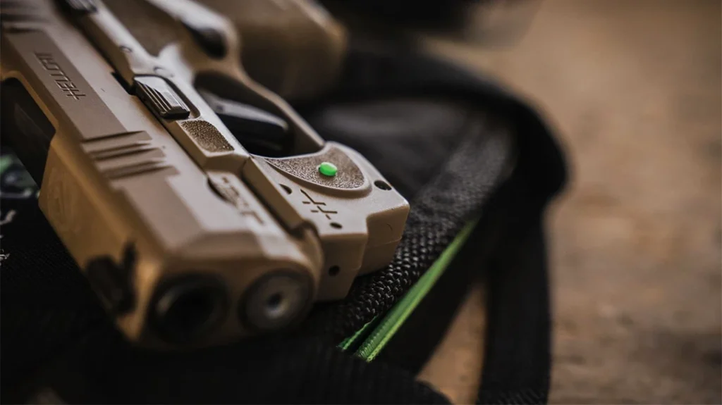 In low- no-light situations, handgun lasers offer a more visible aiming solution.