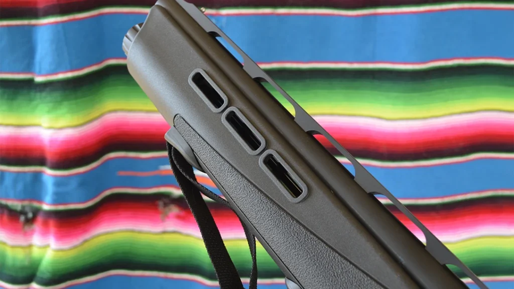 It has a polymer handguard with M-Lok recesses for mounting tactical lights and lasers, and the company added an adjustable handstrap to help the user control recoil.